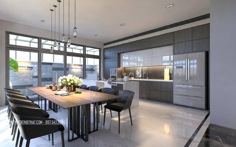 Bàn ghế ăn hiện đại đẹp sang trọng với sự kết nối đồng điệu giữa chiếc bàn gỗ chân sắt sang trọng cùng bộ 8 ghế sẫm màu. Thiết kế phòng ăn biệt thự