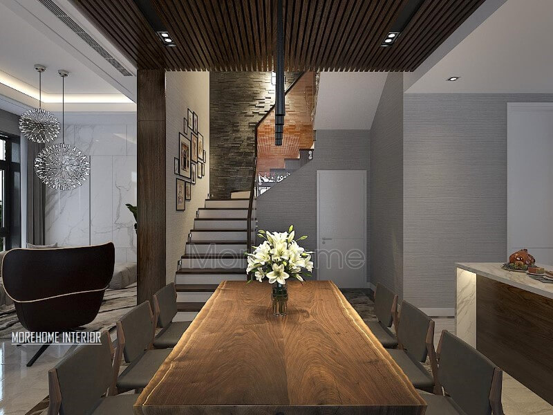 Bàn ăn gỗ óc chó nguyên tấm ấn tượng với đường đối vân độc đáo cùng gamsắc} trầm sang trọng đang trở thành xu hướng trang trí phòng ăn ấn tượng nhất hiện nay. Thiết kế phòng ăn biệt thự