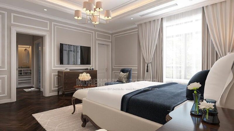 Sắp xếp nội thất phòng ngủ tân cổ điển có tủ quần áo đối diện giường ngủ khoa học, phong thủy.