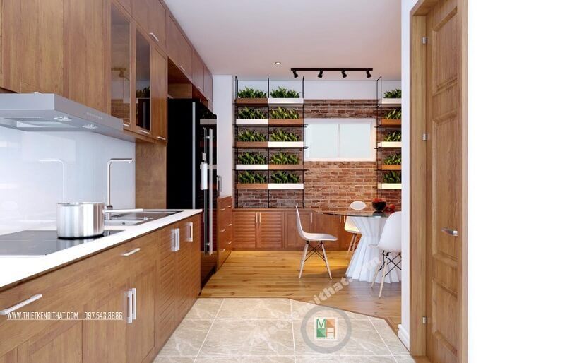 Thiết kế phòng bếp khá nhỏ tuy nhiên lại có lợi thế mở vì có của hướng ra sân trời nên không hề gây ra cảm giác bí bách và khó chịu.