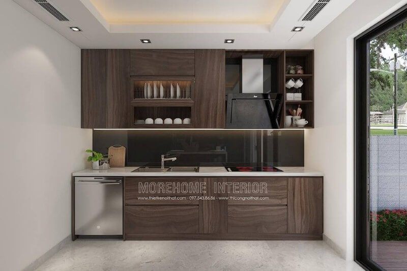 Mẫu tủ bếp với đường vân độc đáo cùng gỗ tối màu đã tạo nên không gian bếp hiện đại sang trọng.