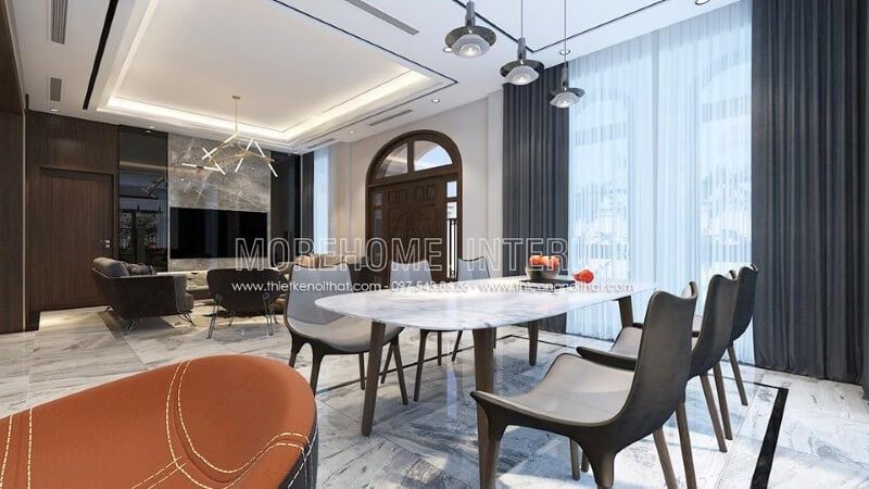 Thiết kế nội thất phòng ăn biệt thự hiện đại liền kề với khu vực phòng khách tạo cho gia chủ thuận tiện hơn trong quá trình dùng bữa cũng như tiếp khách tới chơi nhà