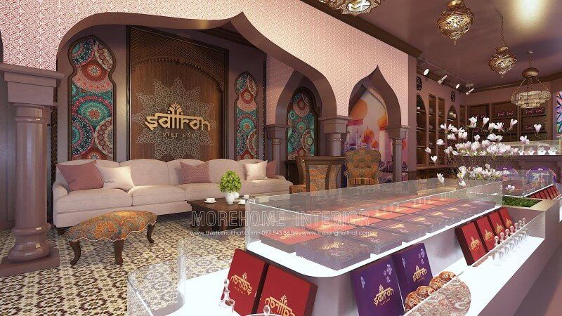 Trang trí showroom làm đẹp Saffron độc đáo theo tông màu chủ đảo hồng và nâu tím kết hợp với bộ sofa bọc nỉ màu hồng tân cổ điển tạo nên một tổng thể hài hòa nhưng không kém phần ấn tượng